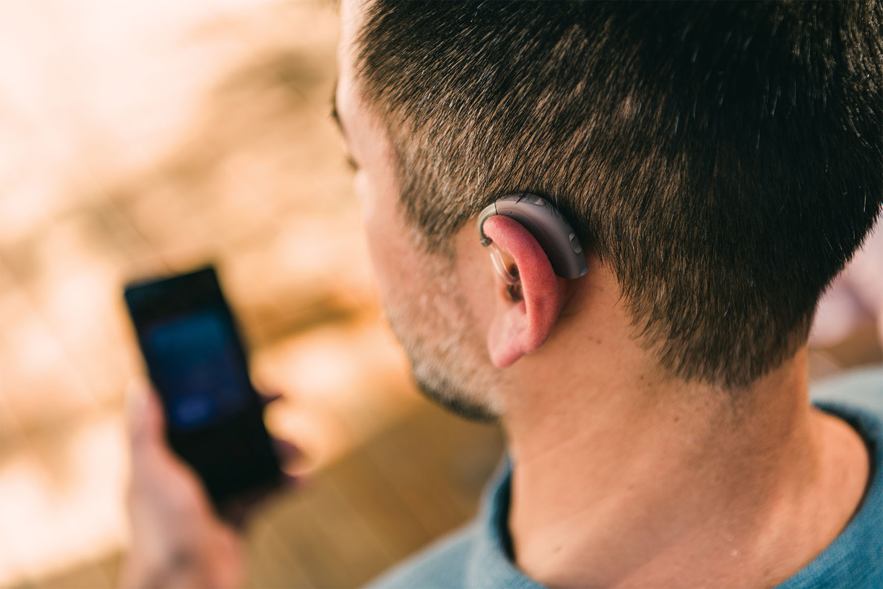 beltone_boostultra_man_wearing_hearing_aid