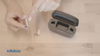 How to place the hearing aid in Premium Charger