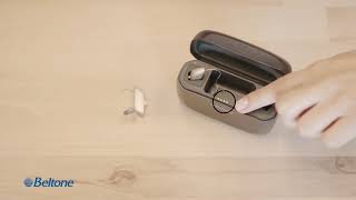 How to turn on/off the rechargeable hearing aid device with the Premium Charger