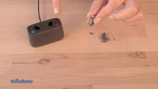 How to place the hearing aids in the desktop charger